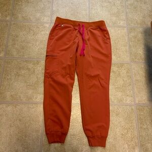 FIGS Zamora Jogger scrub pants in terracotta